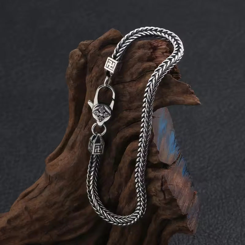 Ethereal Weave: The Silver Braided Bracelet