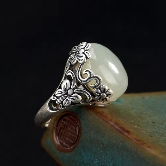 Floral Embrace: The Silver Jade Blossom Ring