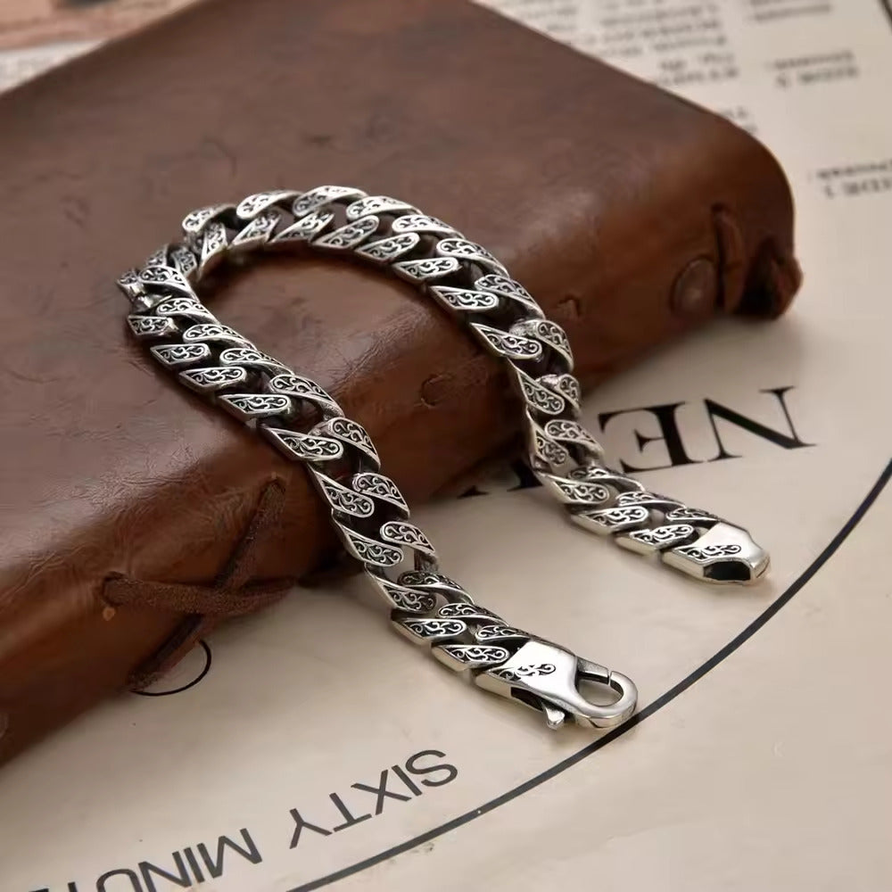 Silver Serpentine: The Twisted Filigree Bracelet