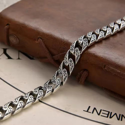 Silver Serpentine: The Twisted Filigree Bracelet