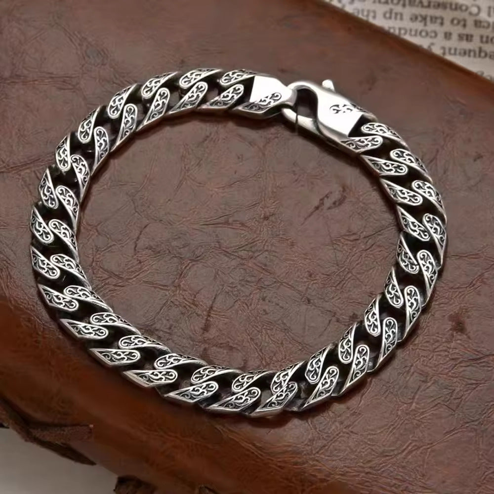 Silver Serpentine: The Twisted Filigree Bracelet