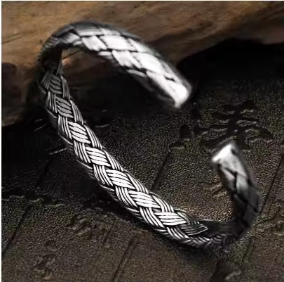 Woven Whispers: The Silver Cuff of Unity