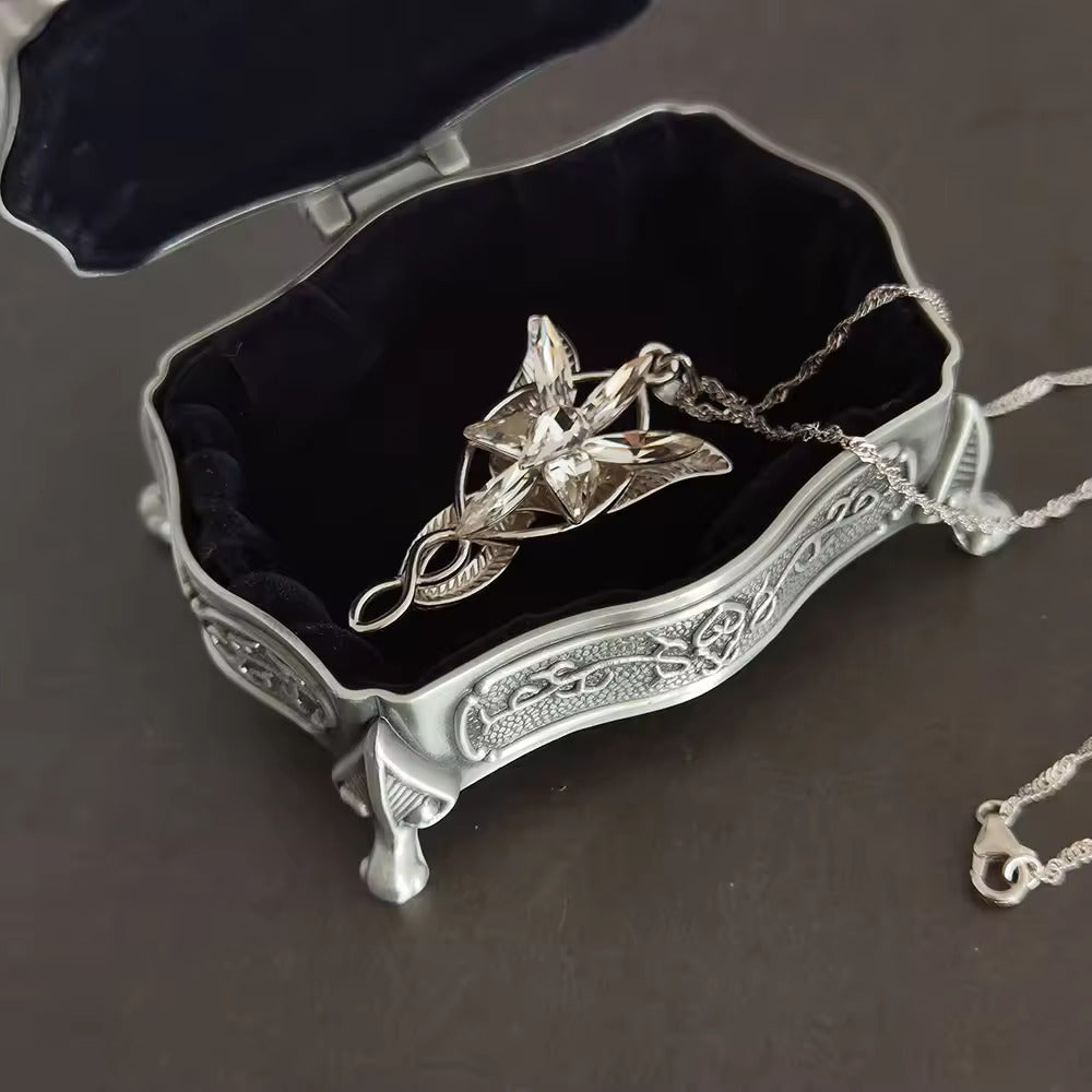 Starlit Petals: The Silver Star Pendant