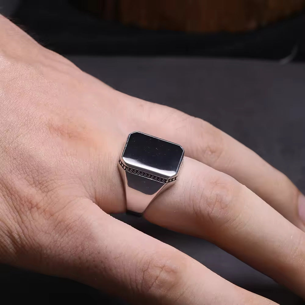 Eclipse of Elegance: The Midnight Shield Ring