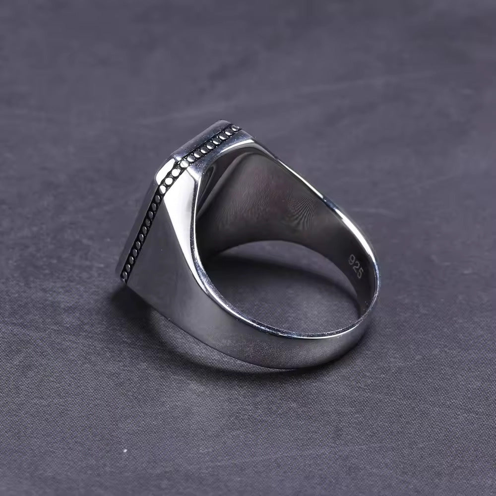 Eclipse of Elegance: The Midnight Shield Ring