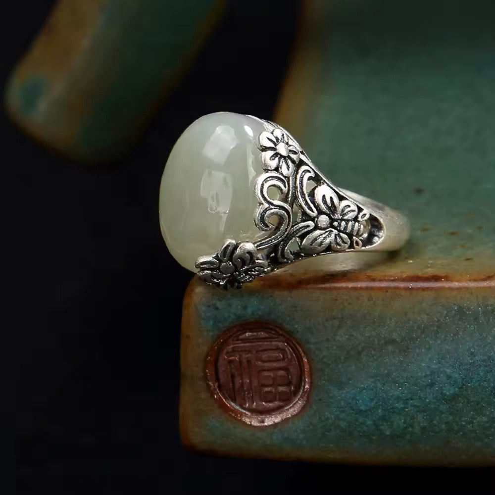 Floral Embrace: The Silver Jade Blossom Ring