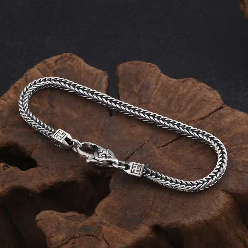 Ethereal Weave: The Silver Braided Bracelet